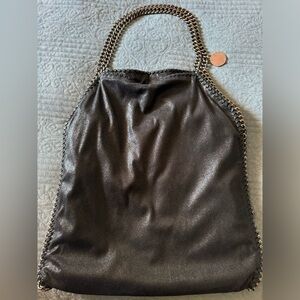 Selling a black Falabella tote bag